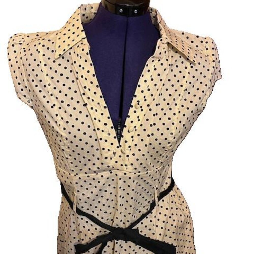 Retro Fit and Flare Polka Dot Dress Yellow with Black dots and sash belt.